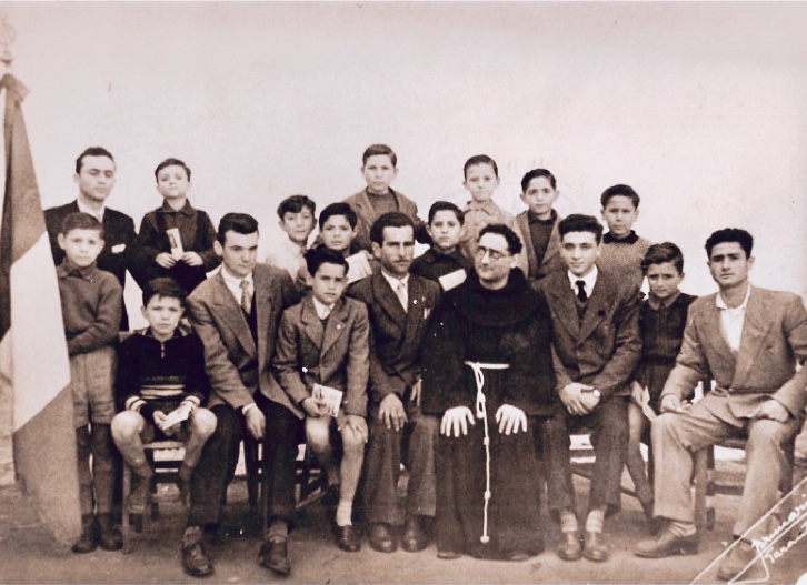 The young Catholic group, including my husband Salvatore, then a catechist (first row, third from the left)